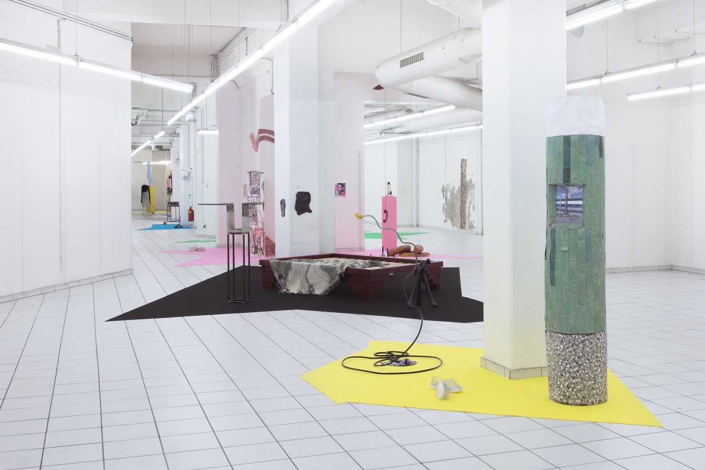 2 Exhibition view, bright room with many objects