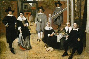 Eine Menschengruppe teils sitzend und stehend