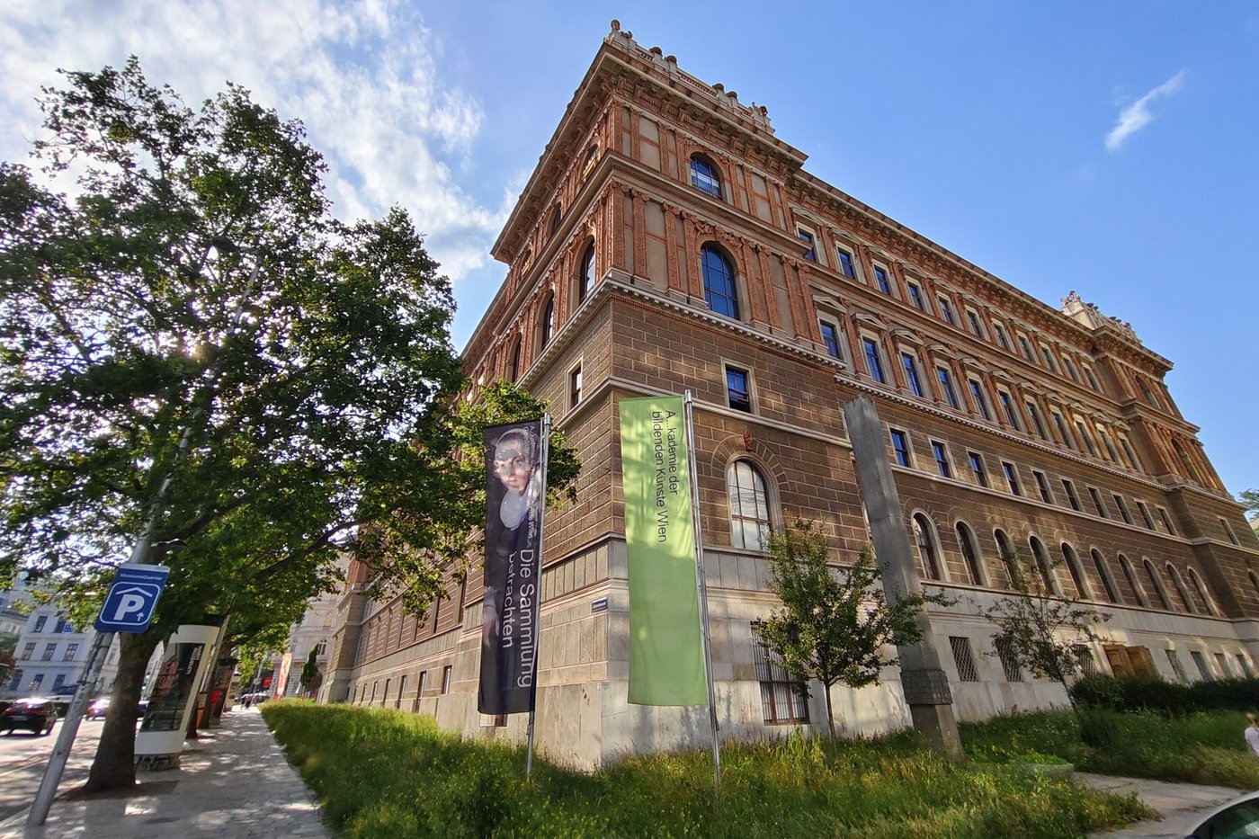Photo of a building with grass and blue sky