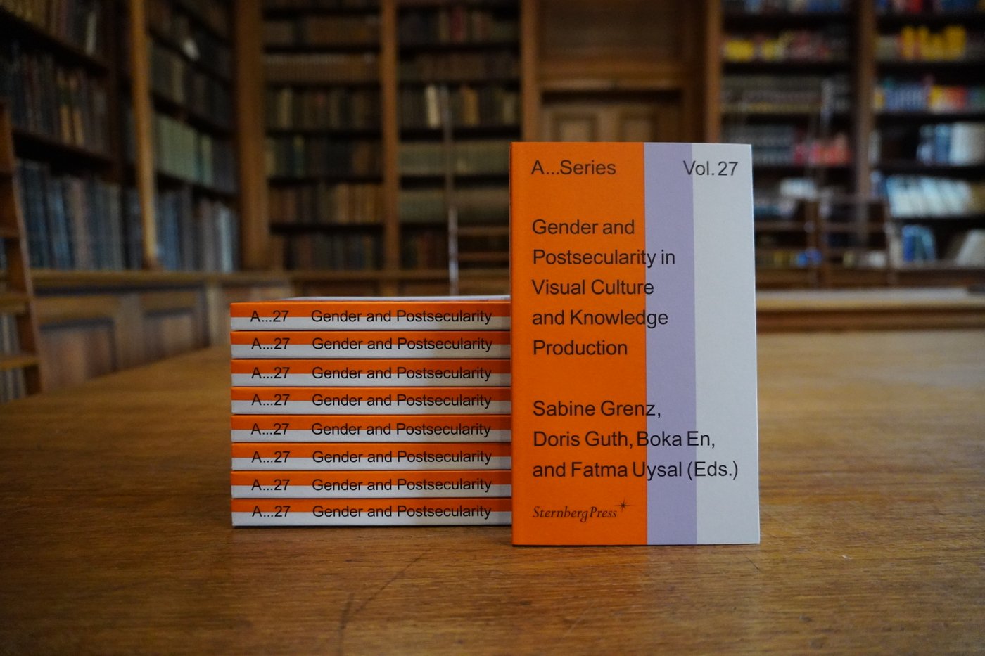 Photo of a series of books in a library